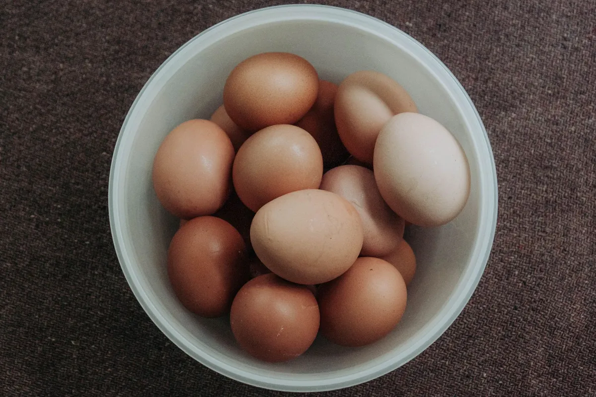 Fresh eggs in a bowl, about 72 calories each