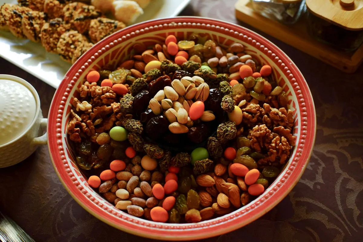 A spread of healthy snacks: fruit, nuts and yogurt