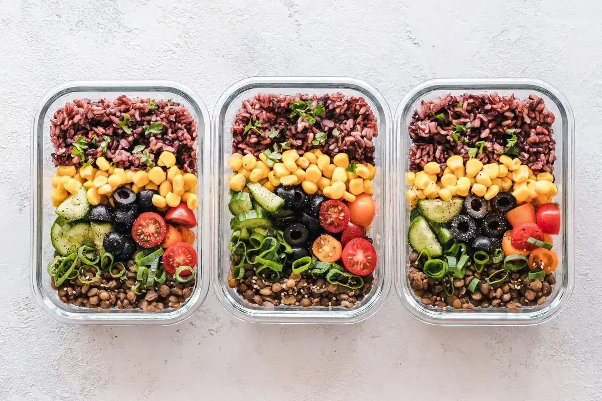 Meal-prep containers packed with balanced meals for the week